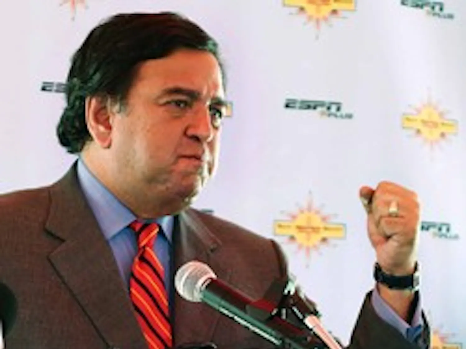Gov. Bill Richardson talks about the New Mexico Bowl during a news conference Monday at University Stadium.