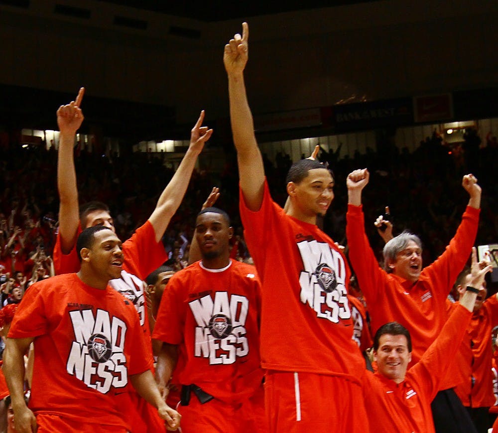 	Darington Hobson joyously celebrates on Selection Sunday after the Lobos found out who they&#8217;d play in the NCAA Tournament . UNM will face Montana on Thursday.