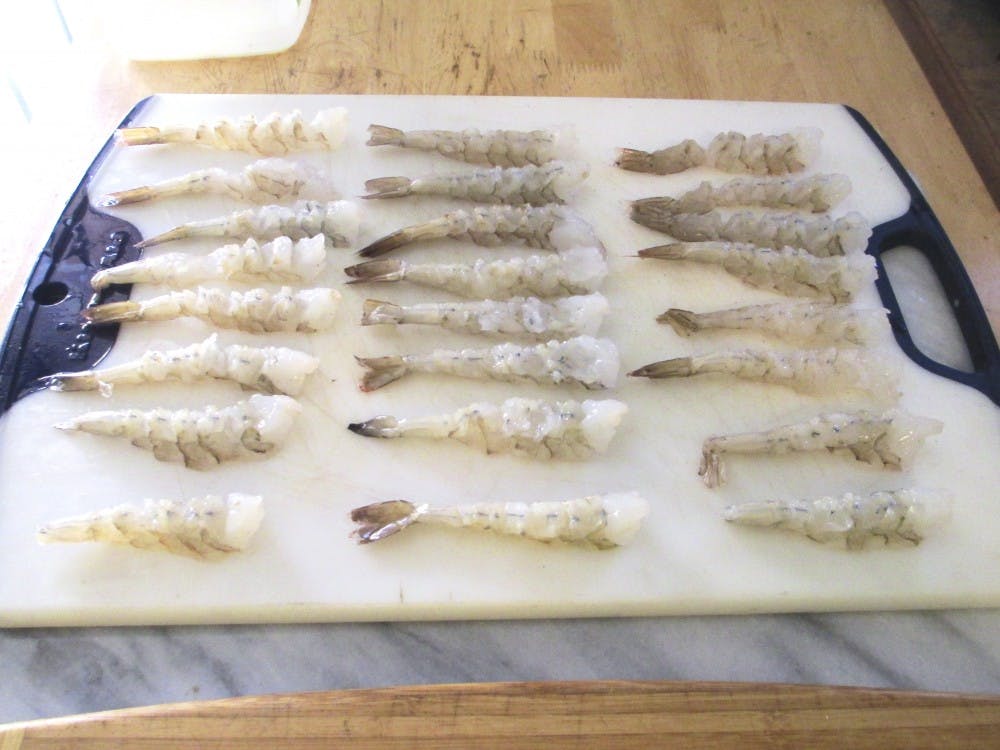 	These shrimp are prepped to be battered in tempura and fried.