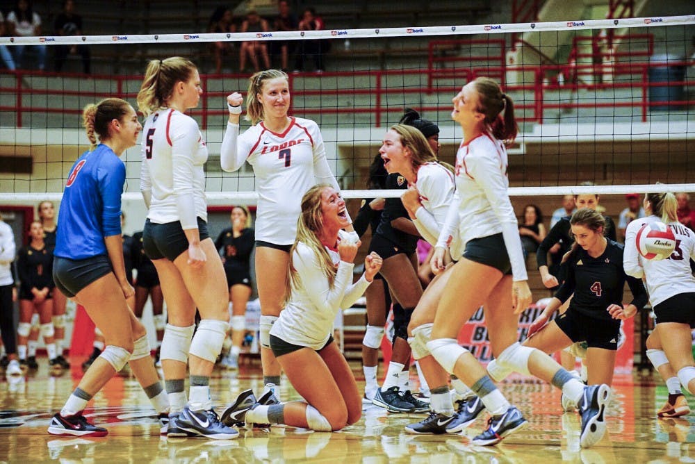 The Lobos celebrate a kill against Arizona State at Johnson Center on Friday August 26, 2016 as their second game in the UNM Tournament. The Lobos beat the Sun Devils 3-1 and will play Idaho and Fairfield Saturday August 27, 2016.&nbsp;