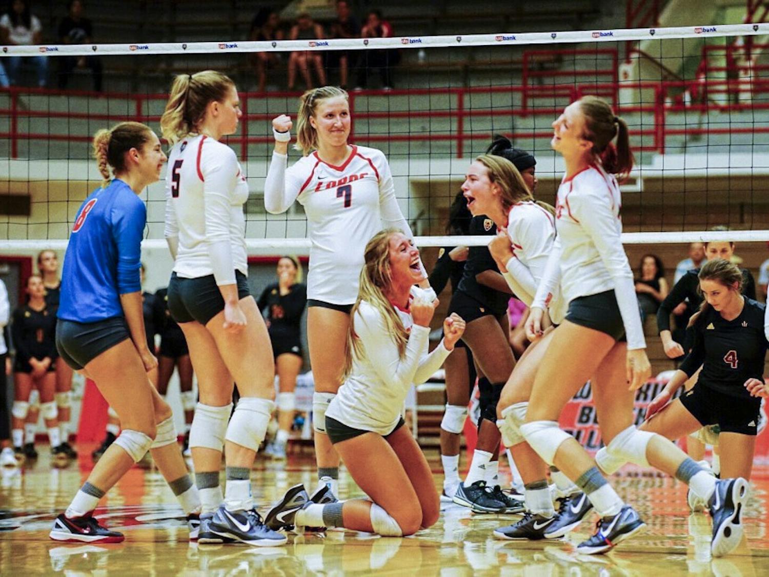 The Lobos celebrate a kill against Arizona State at Johnson Center on Friday August 26, 2016 as their second game in the UNM Tournament. The Lobos beat the Sun Devils 3-1 and will play Idaho and Fairfield Saturday August 27, 2016.&nbsp;