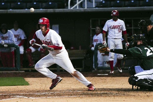 Dane Hamilton bunts during the Lobos' 30-2 romp over Binghamton in Saturday's doubleheader. The Lobos swept the Bearcats 4-0 on the weekend. Hamilton went 7-of-11 from the dish.