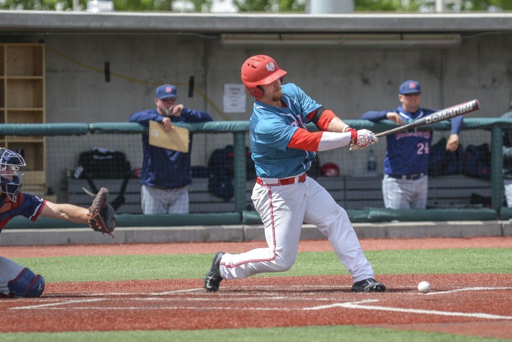 Sophomore Jared Mang chips away at a pitch against a Fresno State pitcher Sunday, April 2, 2017 at Santa Ana Star Field. Mang was honored Mountain West Player of the week.&nbsp;