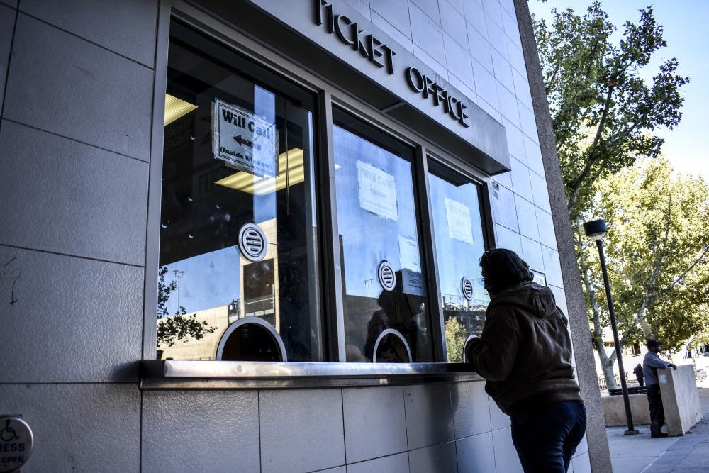 Attendees buy tickets for a matinee at Popejoy Hall on Sunday, Oct. 28.