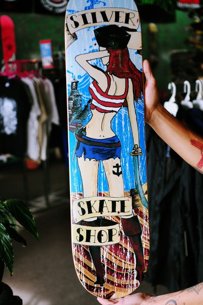 	Locally designed skateboard decks, like the one pictured here, will be sold at the fashion show Friday. The Silver Skate Shop carries decorated decks at 120 Yale Blvd. S.E.