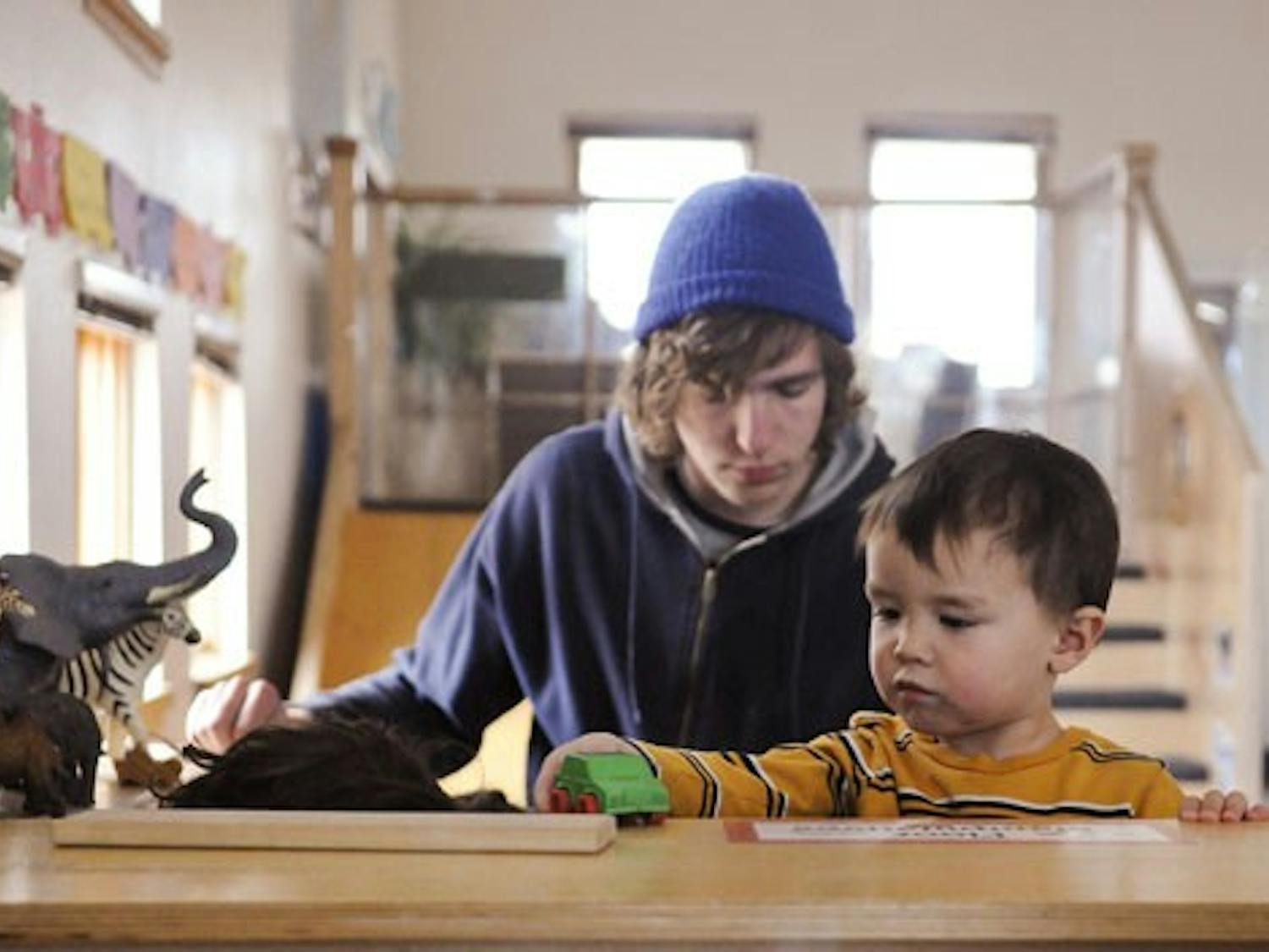 Samuel Campen plays with a car at the UNM Children's Campus on Feb. 17. GPSA is working with legislators to allow graduate student parents to get state subsidies for child care services.