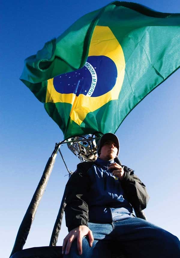 Thiago Marques of San Paolo, Brazil, waits as the pilot for the balloon Nightmare House decides if the wind is too strong to lift off on Sunday at the Albuquerque International Balloon Fiesta. 