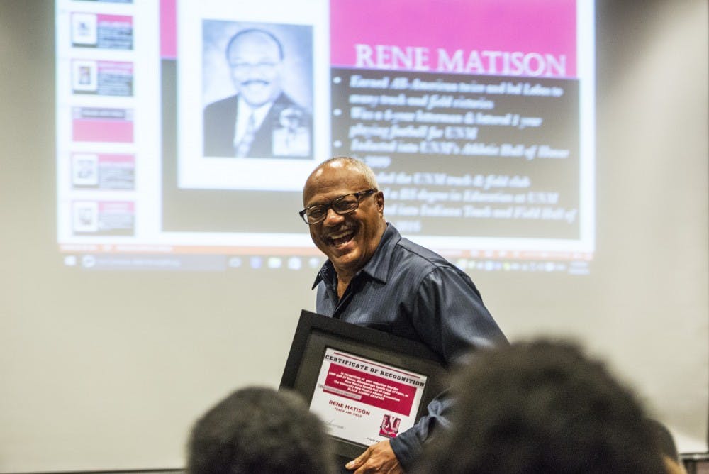 Rene Matison receives his award on Friday, Sept. 30, 2016 at the Centennial Engineering Auditorium. Matison, alongside a handful of other African-American UNM alumni, gathered for a ceremony to recognize their collegiate and athletic accomplishments.