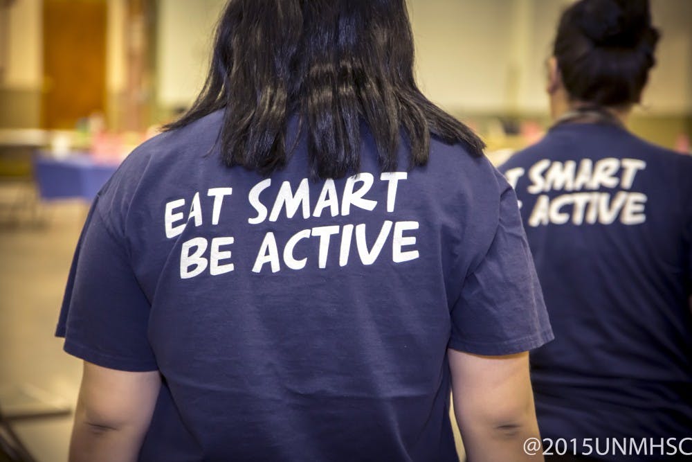 Participants of the Family Fit Challenge wear matching tea shirts that have the "east smart be active" slogan on them. The challenge is a nine week program that is intended to help families stay active with workouts and activities.&nbsp;