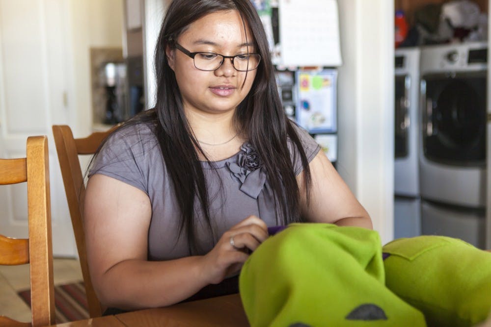Avery Lopez, an engineering student at UNM, prepares the plush toys that she has manufactured for the ACE convention on Saturday, June 28. Lopez has turned her house into a plush toy factory after taking the advice from her professor to find a hobby.
