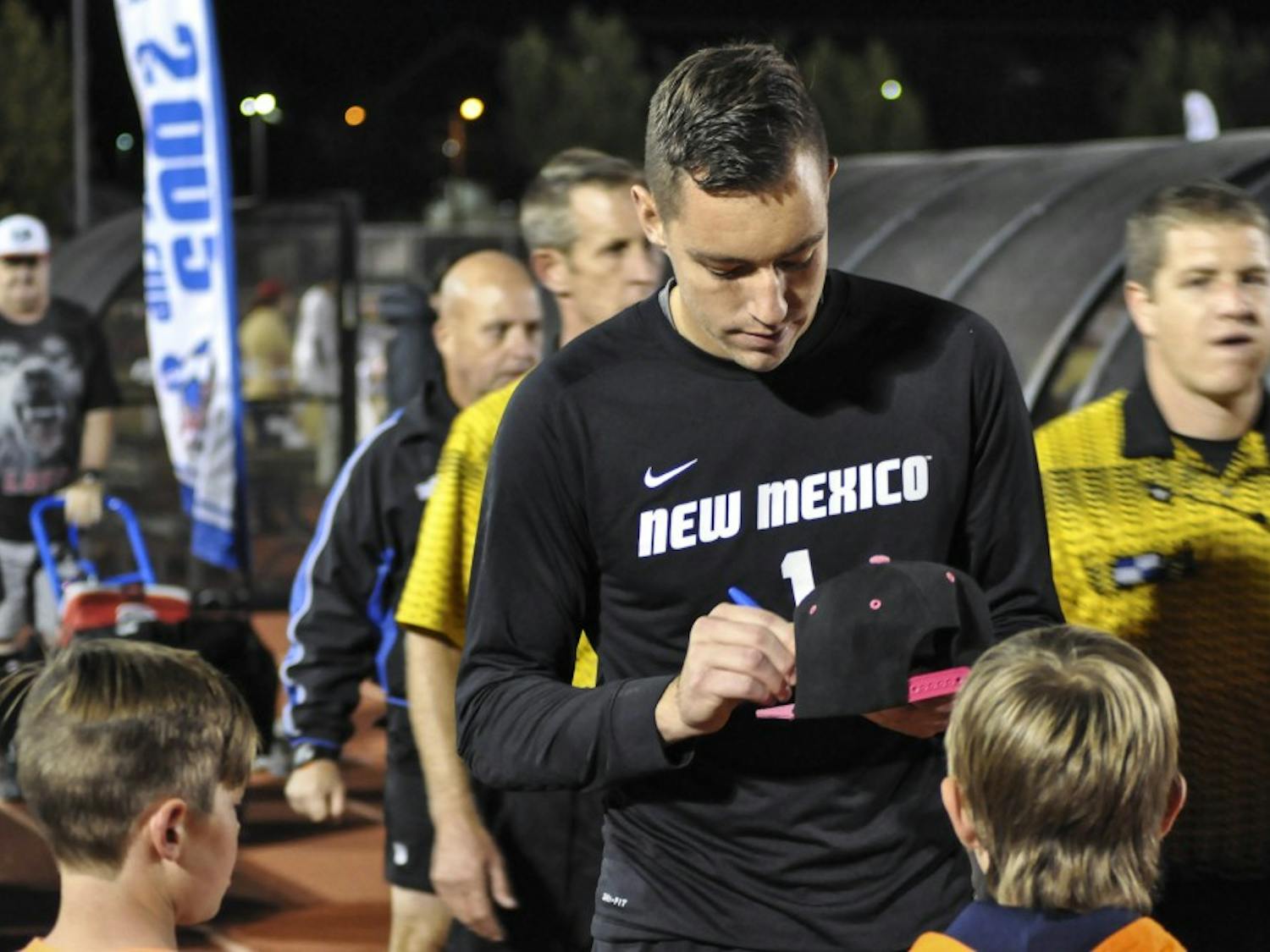 Lobo senior goalkeeper Jason Beaulieu autographs a cap following a game against the University of Denver Pioneers on Oct. 25, 2017. The game ended in a 0-0 draw and included two overtime periods.