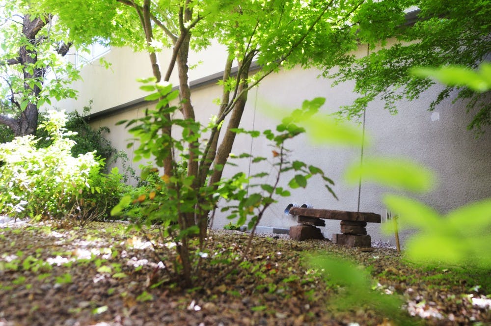 	This little stone bench provides a great place for some deep breathing. It’s located in between Woodward Hall and the Ceria Building.
