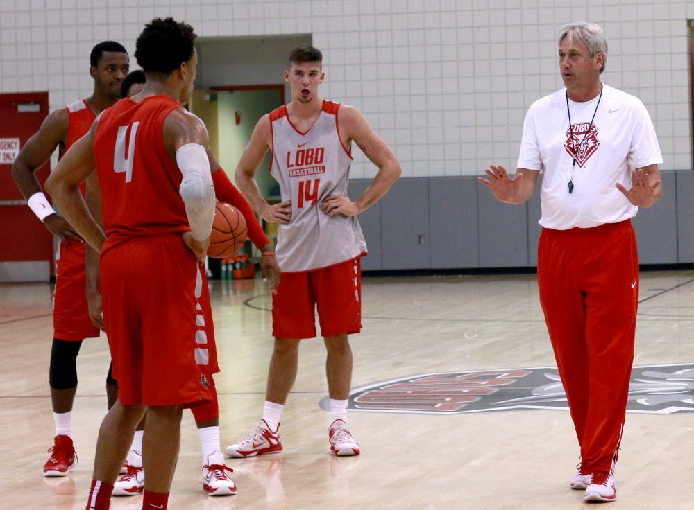 New Mexico coach Craig Neal gives instructions to his players during basketball practice Oct. 2 at the Rudy Davalos Basketball Center. Media members covering the Mountain West tabbled the Lobos to finish sixth in the conference, according the preseason poll released Tuesday.