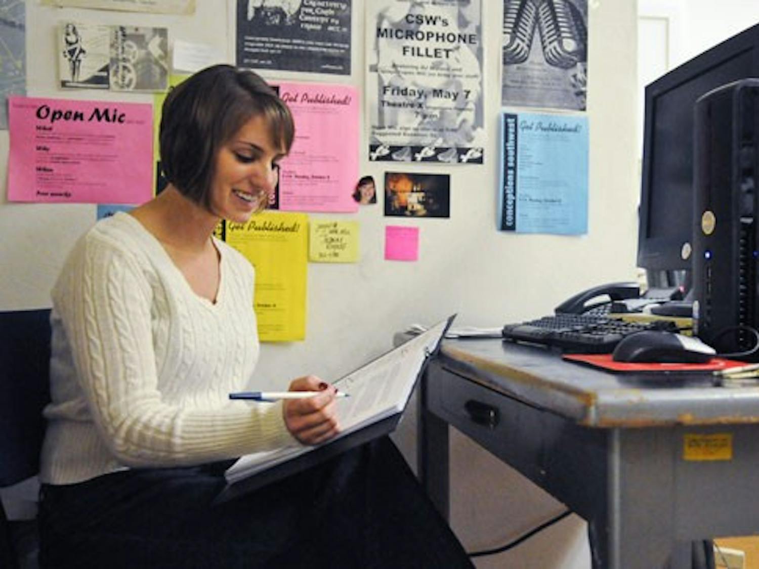 Jennifer Olson edits a fiction piece in Marron Hall on Monday for Conceptions Southwest.