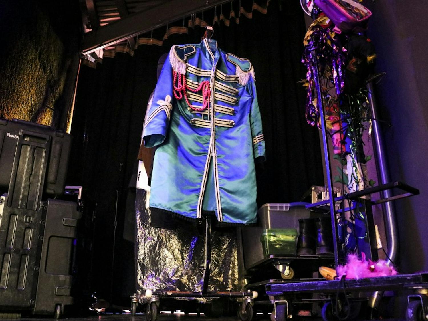 A replica of the iconic Beatles costume hangs backstage in Popejoy on Feb. 3, 2018. 