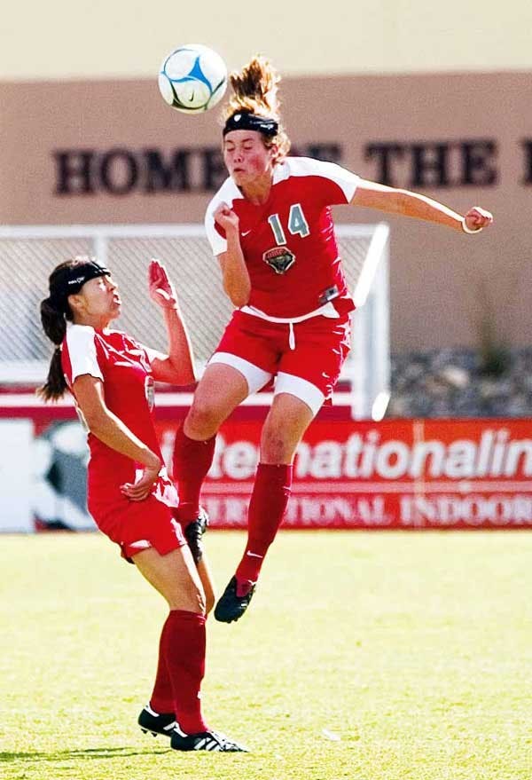 Alexis Ball heads the ball during Sunday's 1-0 loss against TCU at the UNM Soccer Complex. 