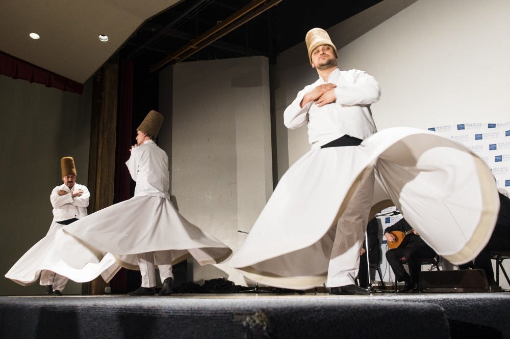 The Whirling Dervishes of Rumi dance to Sufi music at the UNM Continuing Education Center auditorium on Friday evening. UNMs Continuing Education department in collaboration with the Raindrop Foundation hosted the event to break stereotypes of Islam in Albuquerque community.