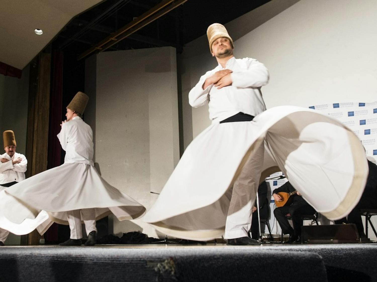The Whirling Dervishes of Rumi dance to Sufi music at the UNM Continuing Education Center auditorium on Friday evening. UNMs Continuing Education department in collaboration with the Raindrop Foundation hosted the event to break stereotypes of Islam in Albuquerque community.