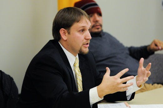Jeremy LaFaver, project specialist for the President's Office, speaks during a strategy session hosted by graduate student associations Monday in the SUB. No administrators were invited to the meeting.
