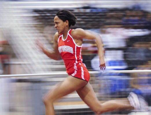 Deanna Young runs the 200-meter dash on Saturday at the Albuquerque Convention Center.
