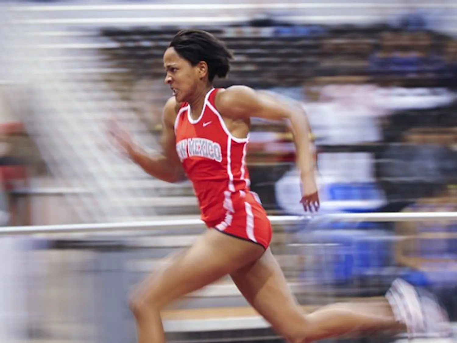 Deanna Young runs the 200-meter dash on Saturday at the Albuquerque Convention Center.