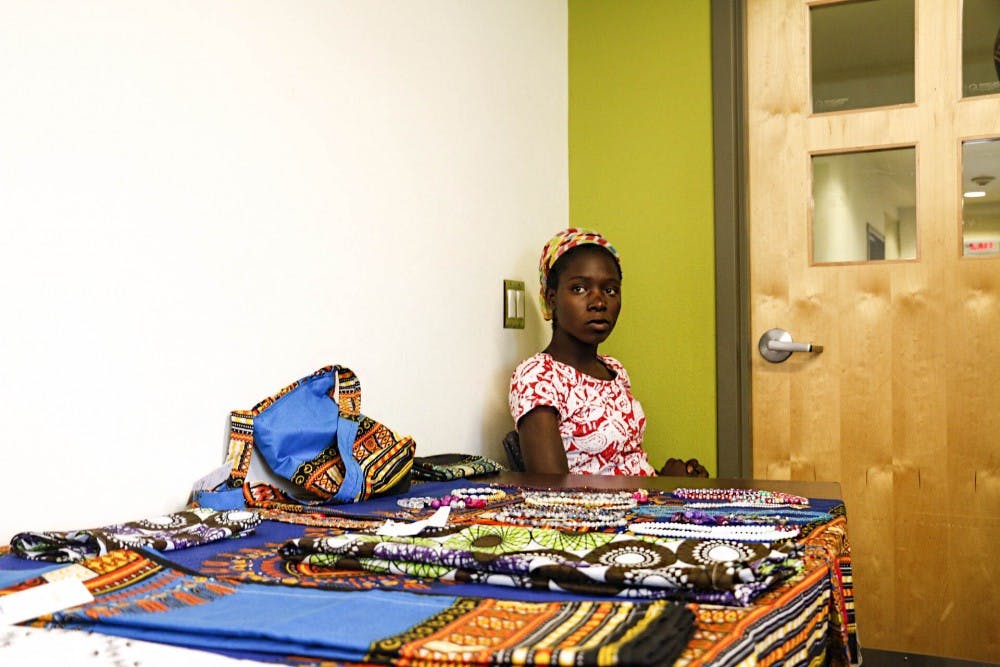 Anita sells handmade clothing and accessories on Tuesday June 20, 2017 at PB&J Family Services. in recognition of World Refugee Day PB&J Family Services and Women?s Global Pathways hosted a crafts fair for refugees currently in Albuquerque. The event sought to raise income for each individual's families. 