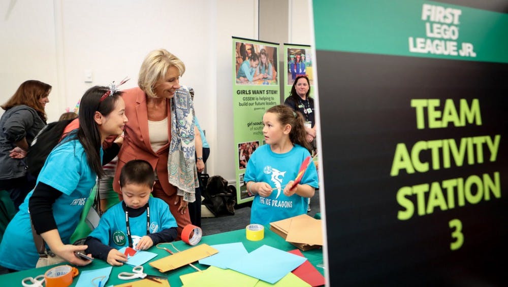 Photo of Betsy DeVos is courtesy of her Twitter feed @BetsyDeVosED.