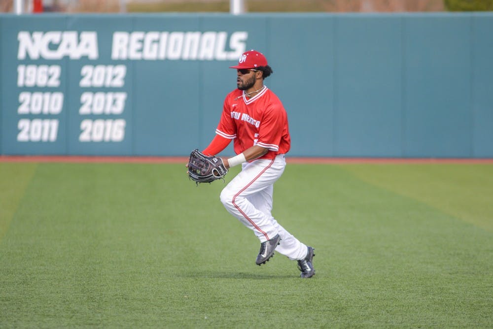 Senior outfielder Andre Vigil picks up a grounder and prepares to throw it to the infield Sunday, Feb. 19, 2017 at Santa Ana Star Field. New Mexico will head south on Tuesday to take on New Mexico State for its next game on Tuesday night.&nbsp;