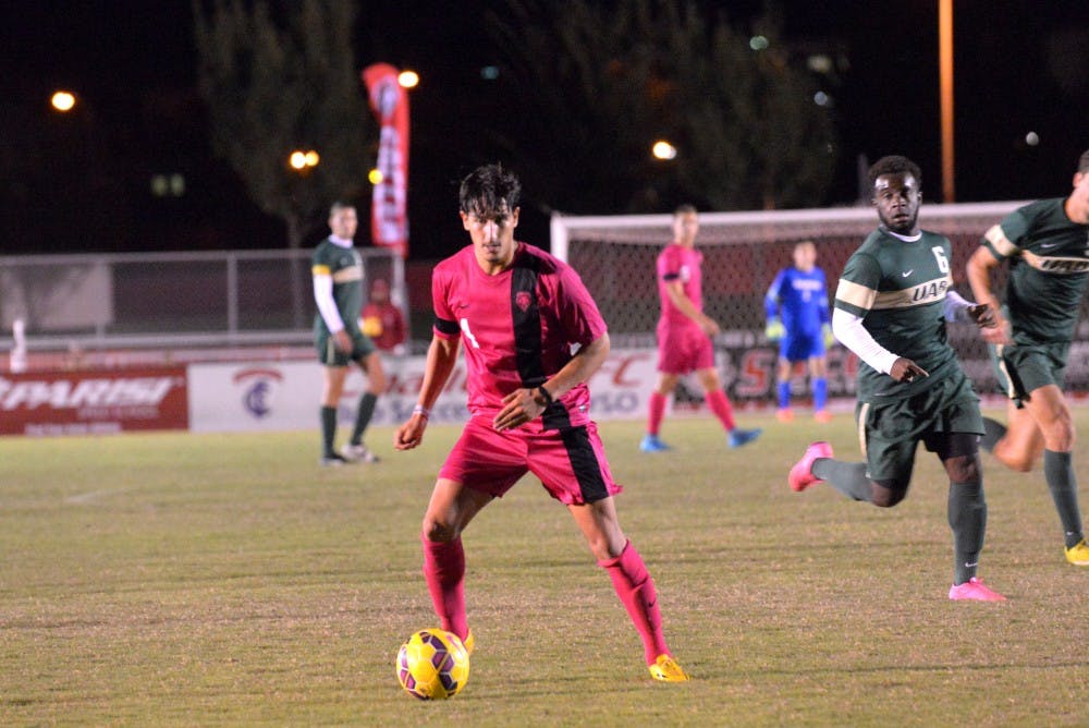 Freshman midfielder Francesco Casucci pauses to pass the ball at the UNM Soccer Complex Sunday, Oct. 18, 2015. Casucci won the Lobos seventh C-USA player of the week award. 