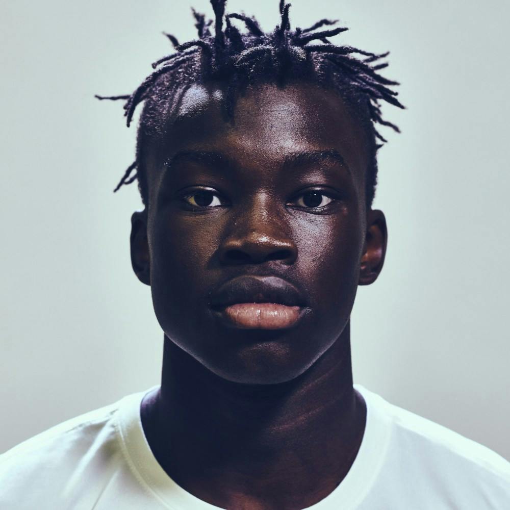 Portrait of Emmanuel Kuac courtesy of Deng Camp.