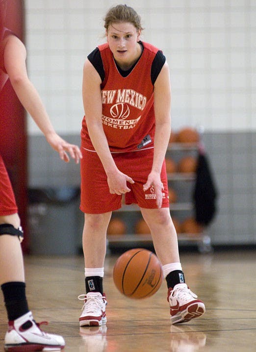 UNM guard Amy Beggin dribbles during practice Saturday. The Lobos, whose record is 15-12 overall, will play UNLV on Tuesday in Las Vegas. 