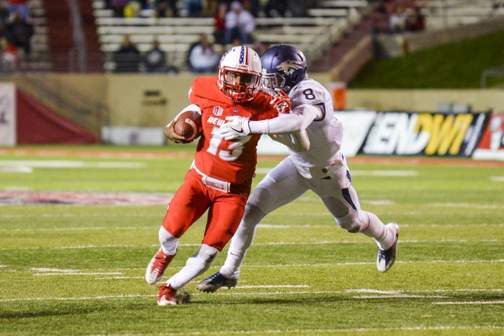 Redshirt junior quarterback Lamar Jordan breaks past a Nevada University defenseman Saturday, Nov. 5, 2016 at University Stadium. The Lobos will attempt their sixth straight season win this Saturday when they play Colorado State.