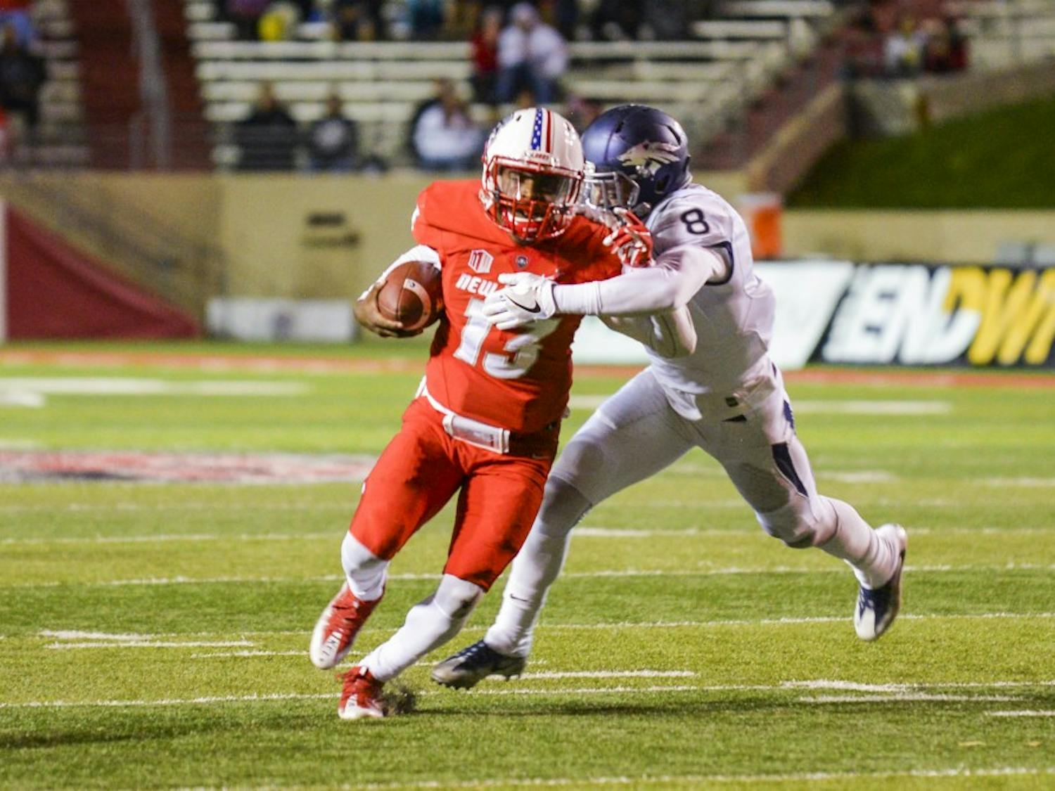 Redshirt junior quarterback Lamar Jordan breaks past a Nevada University defenseman Saturday, Nov. 5, 2016 at University Stadium. The Lobos will attempt their sixth straight season win this Saturday when they play Colorado State.
