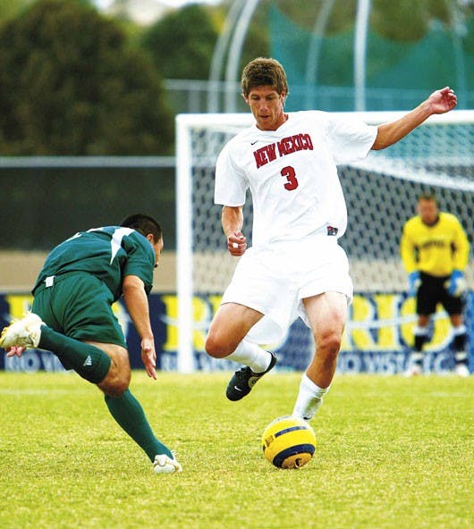 Lobo defender Andrew Boyens clears the ball during the first half of the  1-0 overtime victory over Sacramento State on Sunday at the UNM Soccer Complex.