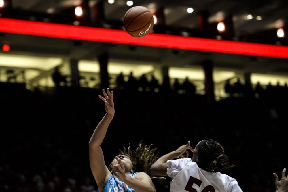 Sophomore Jaisa Nunn attempts a lay up during the Lobos game against New Mexico State Tuesday, Nov. 15, 2015 at WisePies Arena. The Lobos suffered their first season loss against Texas Tech 69-58.&nbsp;