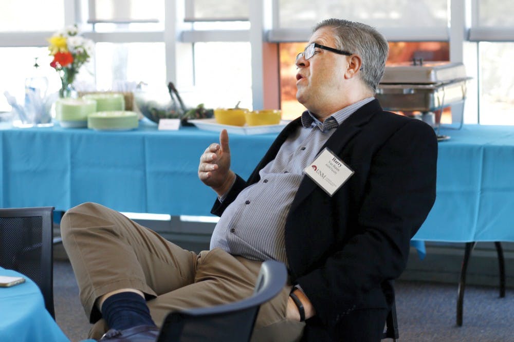 Anderson Faculty Member Henry Van Buren attends the Anderson School of Management's Business Community Open House event Friday afternoon at the Jackson Student Center. The open house was intended to bring in local business owners to showcase what the school can offer to the community.