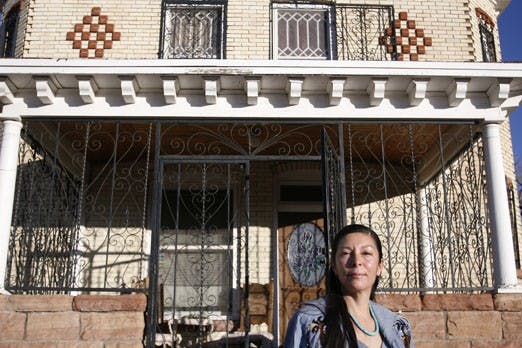 Danette Lovato Pimentel stands outside her home office on Broadway.