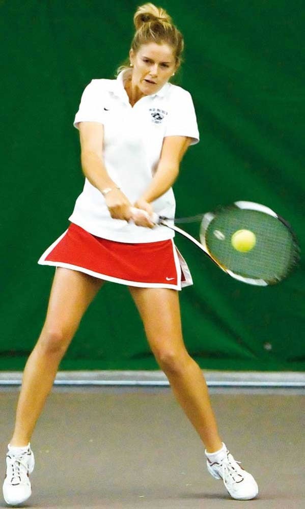 UNM's Emma Hayman hits a backhand during the Women's Tennis Individual at the UNM Tennis Complex on Sunday. 