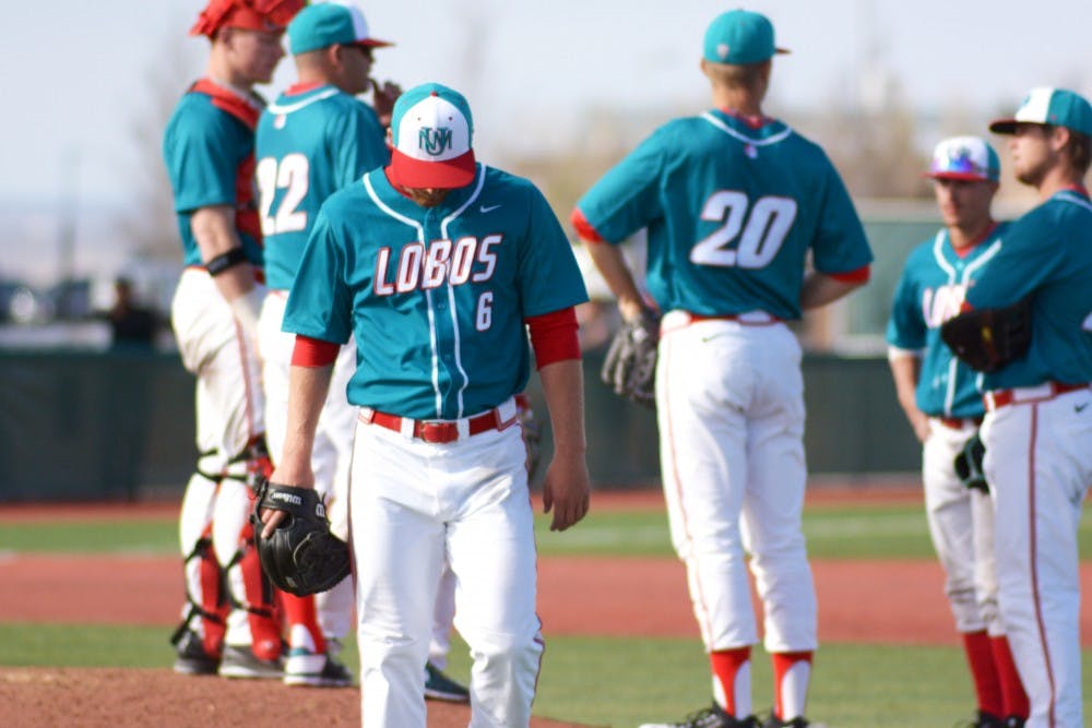 Lobo Senior, Colton Thomson, leaves the pitcher's mound after handing over the pitching position to Senior Drew Bridges at the bottom of the 6th inning of the Lobo v. DBU game on Sunday, March 6th 2016. The Lobos lost, 12 -11.