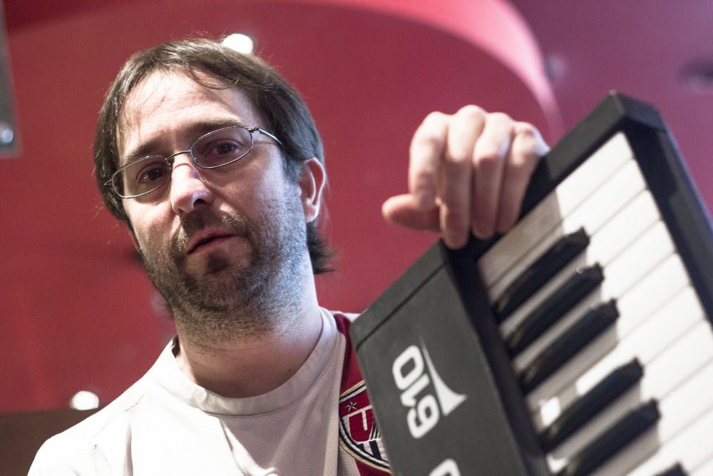 	Aaron Trumm goes over the instruments he utilizes to make his music on June 6. Trumm had cystic fibrosis, but received a lung transplant and now uses that experience as his musical inspiration.