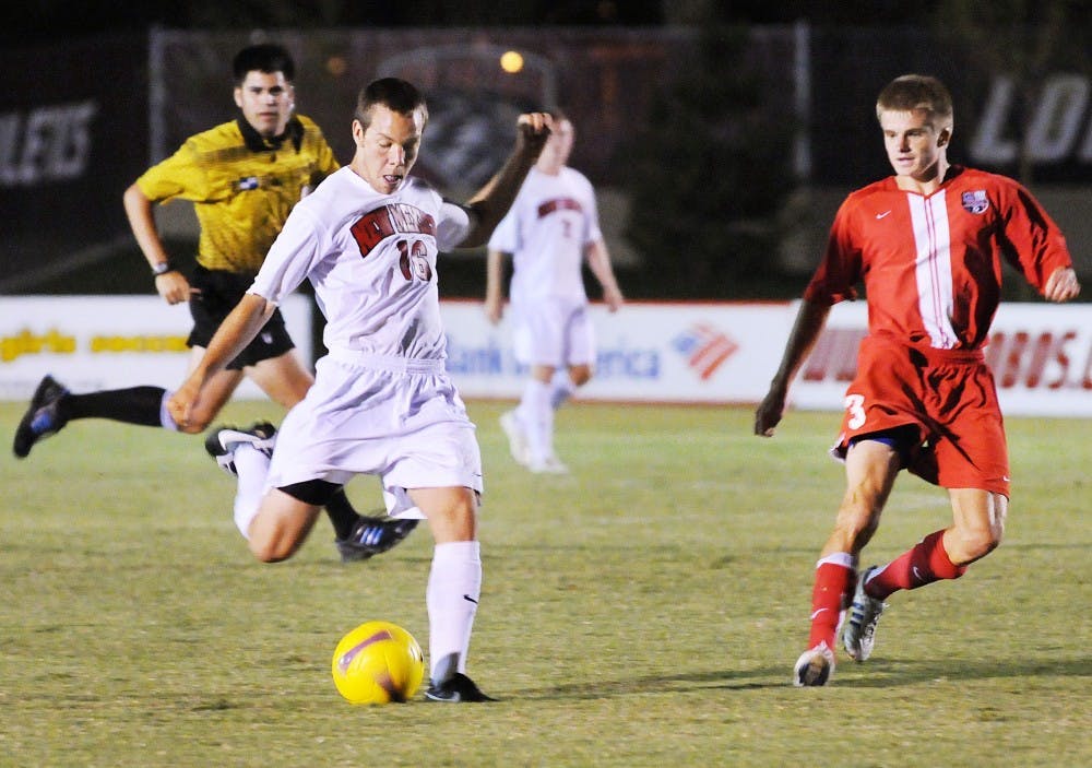	Levi Rossi, left, boots the ball during UNM’s 4-0 exhibition win Thursday over CSU-Pueblo at the UNM Soccer Complex.