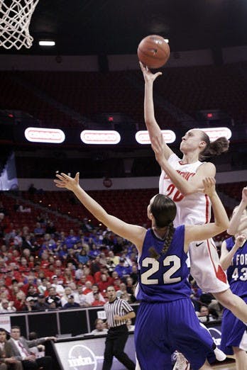 Sara Halasz puts up a finger roll over
