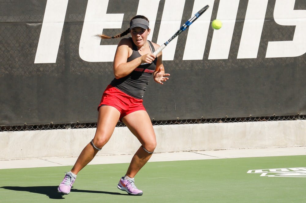 Freshman Roth Copas sends the ball over the net in a singles match Nov. 1, 2016 at the McKinnon Family Tennis Center. The Lobos will play Southern Illinois this Saturday at 2 p.m..