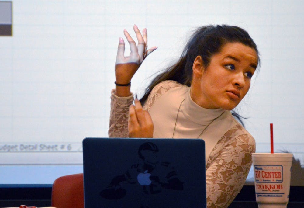 ASUNM Vice President Alex Cervantes explains ASUNM's budget to senators Wednesday night in the cellar of Hokona Hall. ASUNM debated over the budget cuts for certain clubs and organizations.&nbsp;