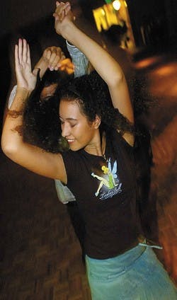 Students Gabby Rodriguez and Eric Ortiz dance during Noche de Extravaganza, part of the 2006 Hispanic Culture Festival. The dance was held in the SUB on Friday.