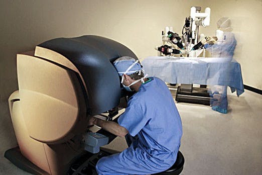 	A surgeon demonstrates laparoscopic surgery in this photo illustration. The first ever robotic pediatric surgery was performed at UNM Hospital this summer.