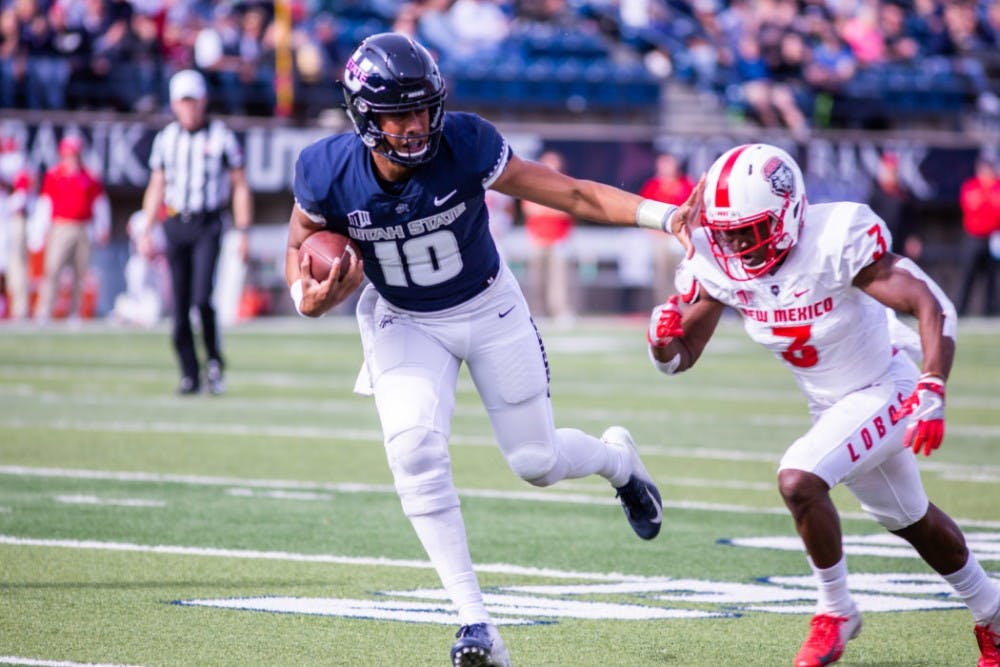 Utah State University Jordan Love with a touchdown against New Mexico in the Maverik stadium in Logan, Utah on Oct. 27, 2018. Utah State defeated the Lobos 61-19, making the Aggies season record 7 and 1. (Megan Nielsen)