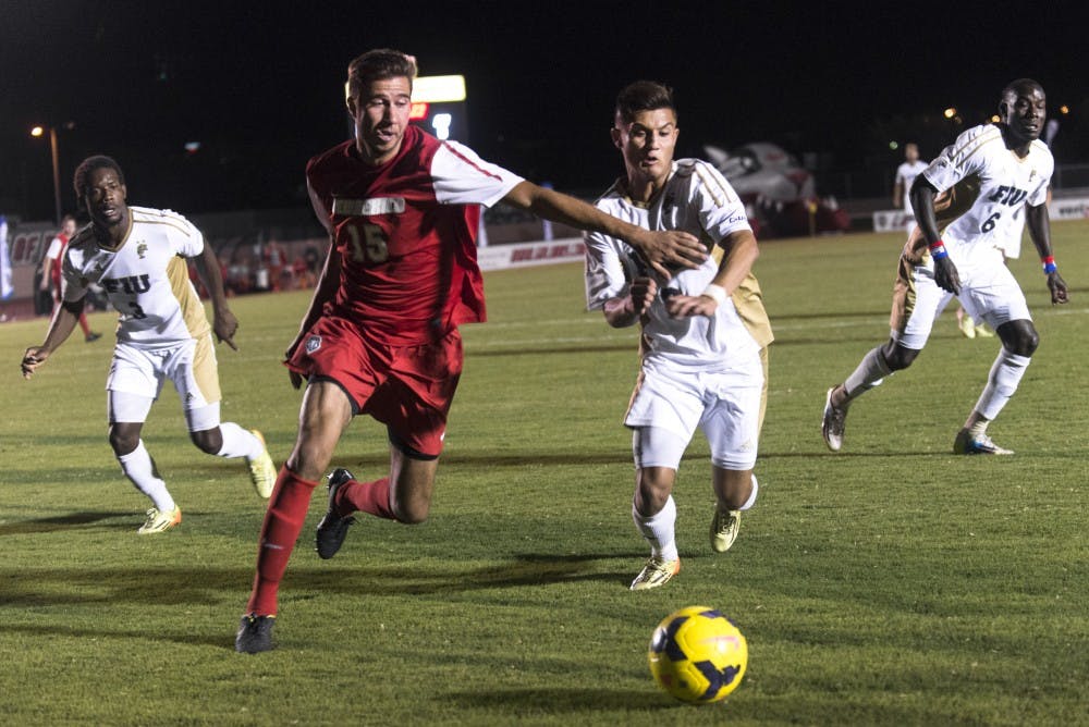New Mexico defender Chris Gurule attempts to keep the ball in the Lobos’ possession during the game against Florida International on Saturday. The Lobos defeated the Panthers 2-0.