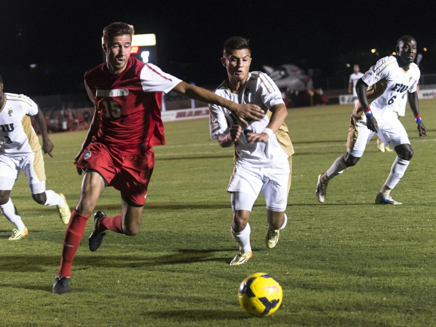 New Mexico defender Chris Gurule attempts to keep the ball in the Lobos’ possession during the game against Florida International on Saturday. The Lobos defeated the Panthers 2-0.