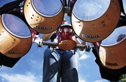 Drummer Vanessa Chavez warms up for marching band practice at Johnson Field on Monday.